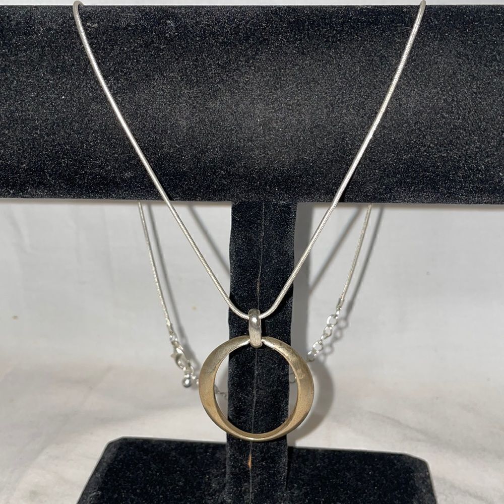 Necklace with O emblem